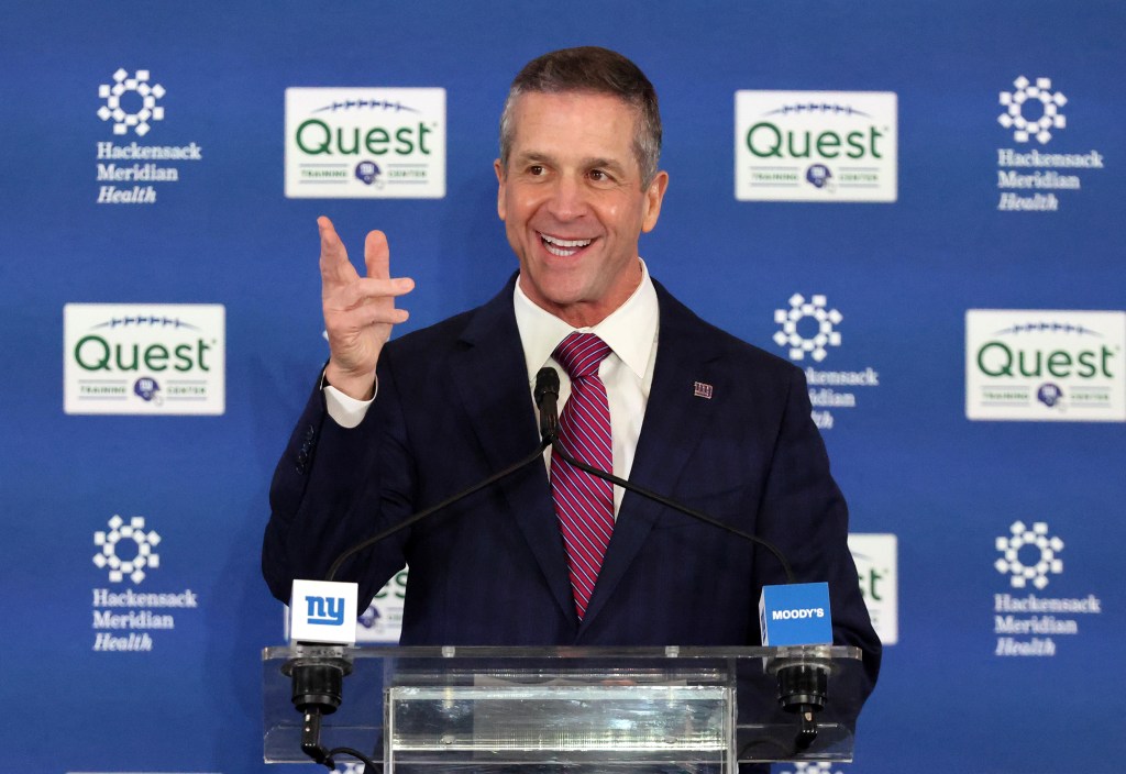 New New York Giants head coach John Harbaugh smiles and gestures while speaking at a press conference where he was introduced as the new head coach at the Giants Training Facility in East Rutherford, New Jersey.