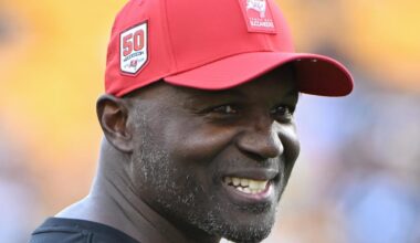 Aug 16, 2025; Pittsburgh, Pennsylvania, USA; TTampa Bay Buccaneers head coach Todd Bowles () warms up for a game against the Pittsburgh Steelers at Acrisure Stadium. Mandatory Credit: Barry Reeger-Imagn Images