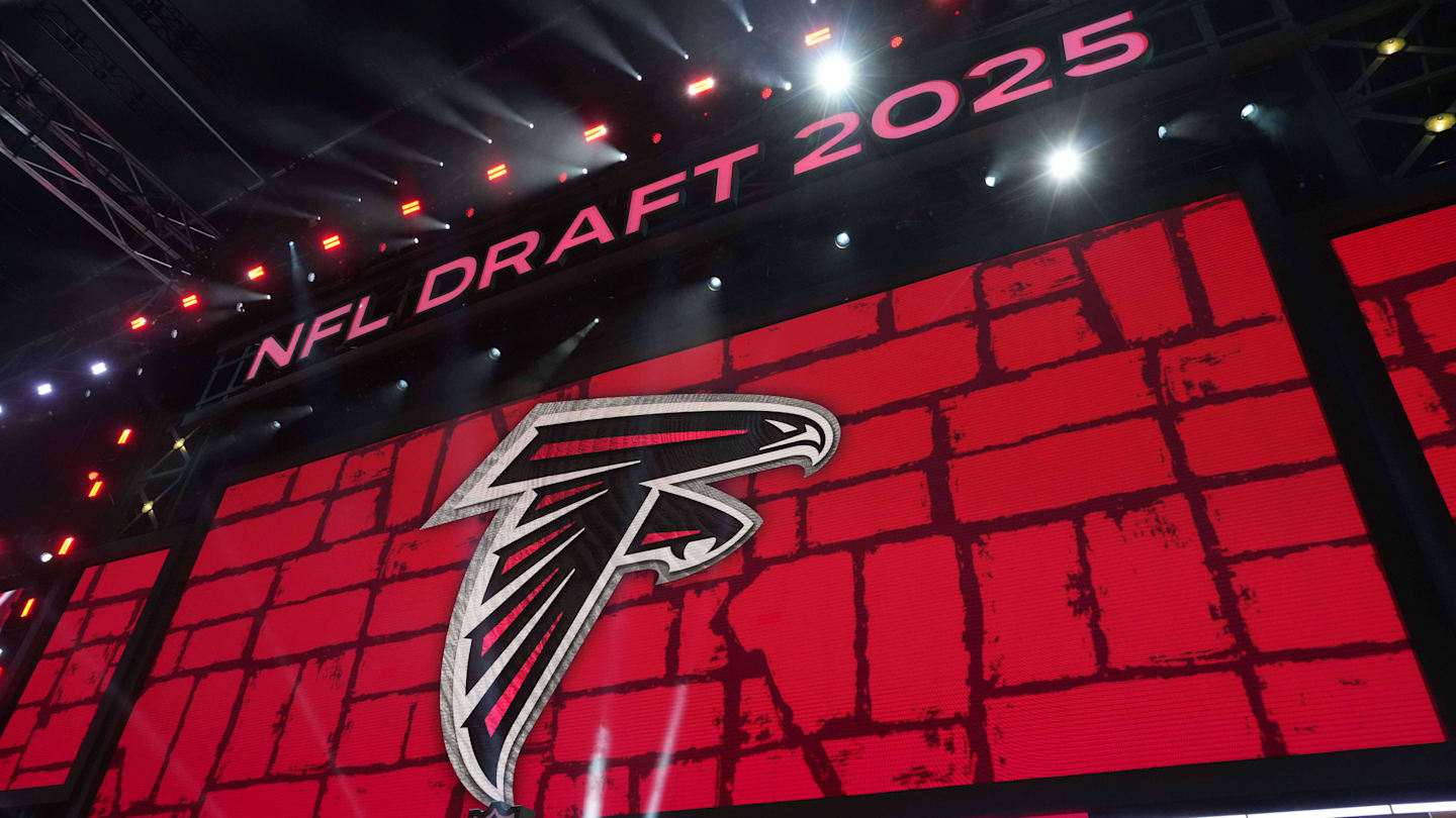 The Atlanta Falcons logo is projected on the video board during the NFL Draft at Lambeau Field.