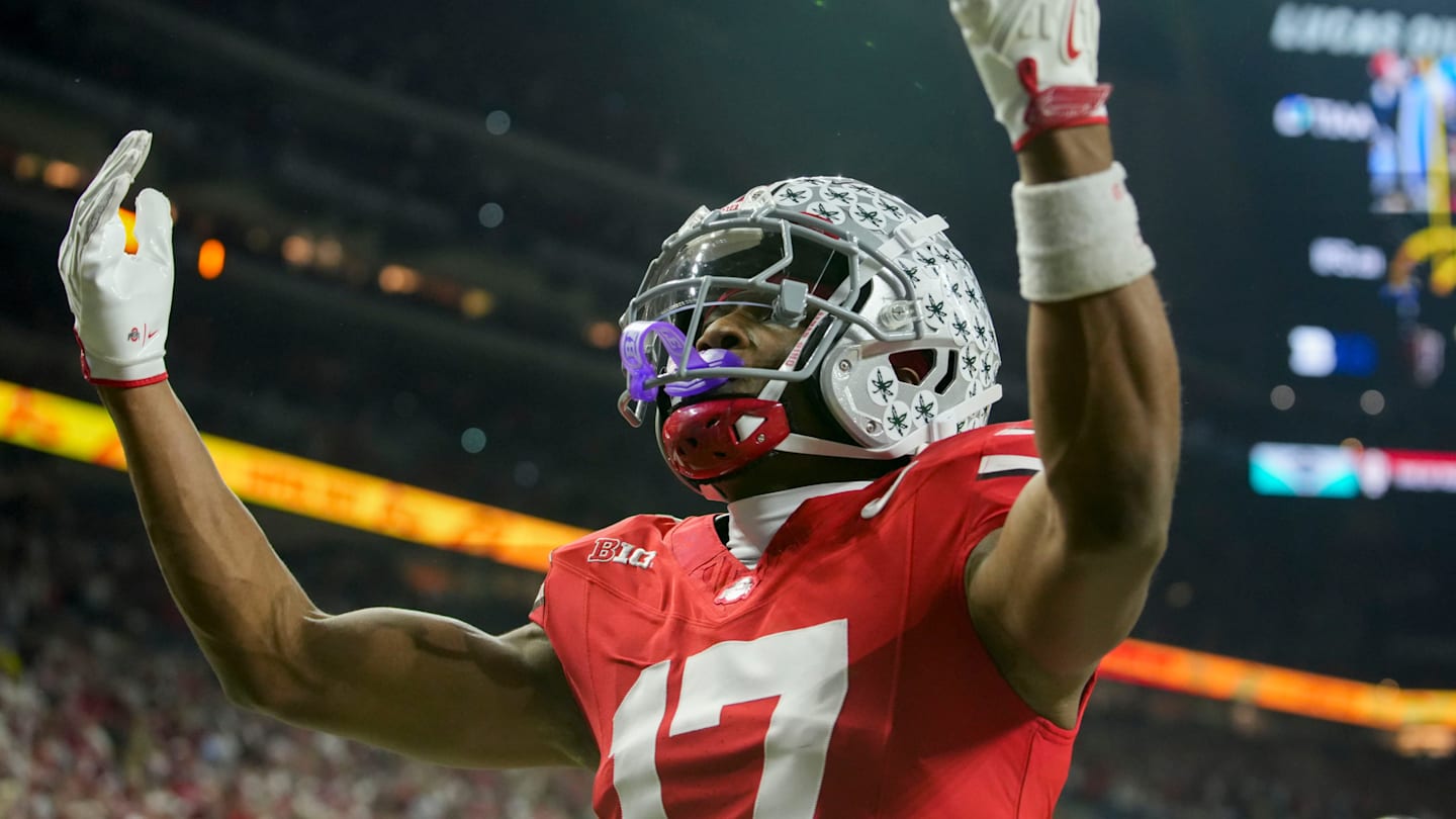 Ohio State Buckeyes wide receiver Carnell Tate (17) celebrates a touchdown Saturday, Dec. 6, 2025, during the Big Ten football championship against the Indiana Hoosiers at Lucas Oil Stadium in Indianapolis.