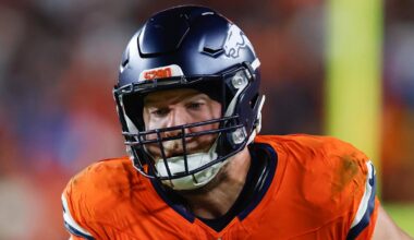 Nov 30, 2025; Landover, Maryland, USA; Denver Broncos tight end Adam Trautman (82) carries the ball after a reception against the Washington Commanders in the second quarter of the game at Northwest Stadium. Mandatory Credit: Peter Casey-Imagn Images