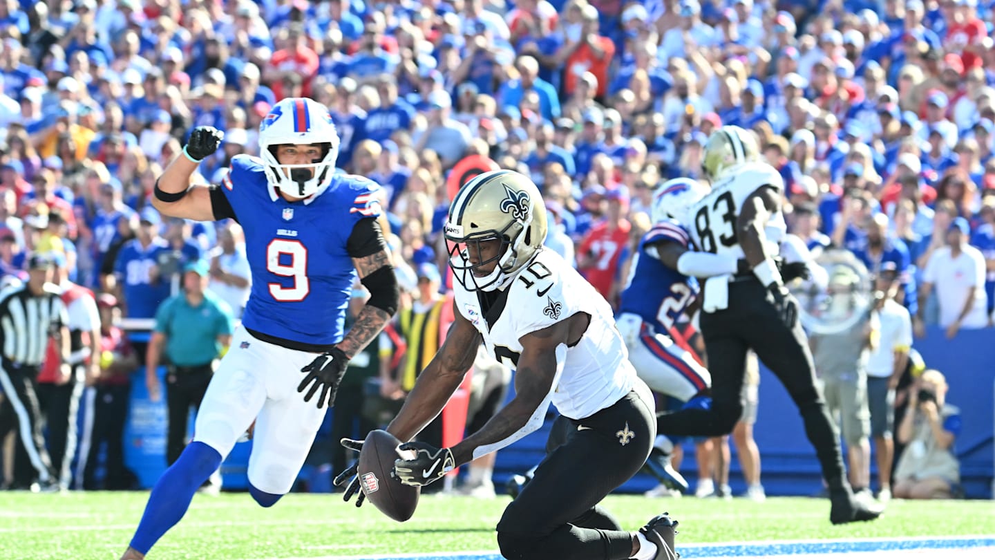 Sep 28, 2025; Orchard Park, New York, USA;  New Orleans Saints wide receiver Brandin Cooks (10) drops a pass in the end zone under pressure from Buffalo Bills safety Taylor Rapp (9) during the fourth quarter at Highmark Stadium. Mandatory Credit: Mark Konezny-Imagn Images