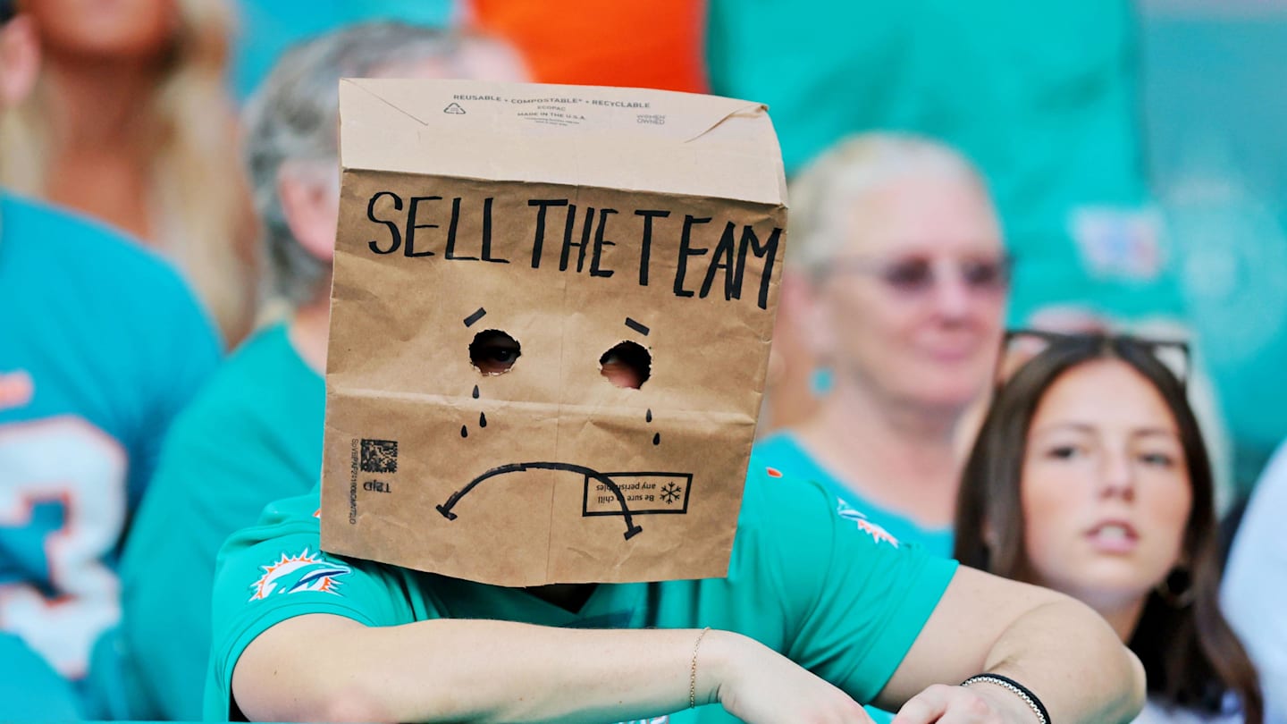 Miami Dolphins fans look on at Hard Rock Stadium