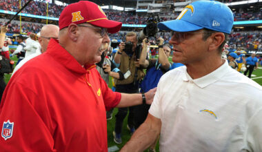 Sep 29, 2024; Inglewood, California, USA; Kansas City Chiefs coach Andy Reid shakes hands with Los Angeles Chargers coach Jim Harbaugh after the game at SoFi Stadium.