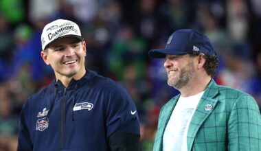 Seattle Seahawks head coach Mike Macdonald and general manager John Schneider on the podium