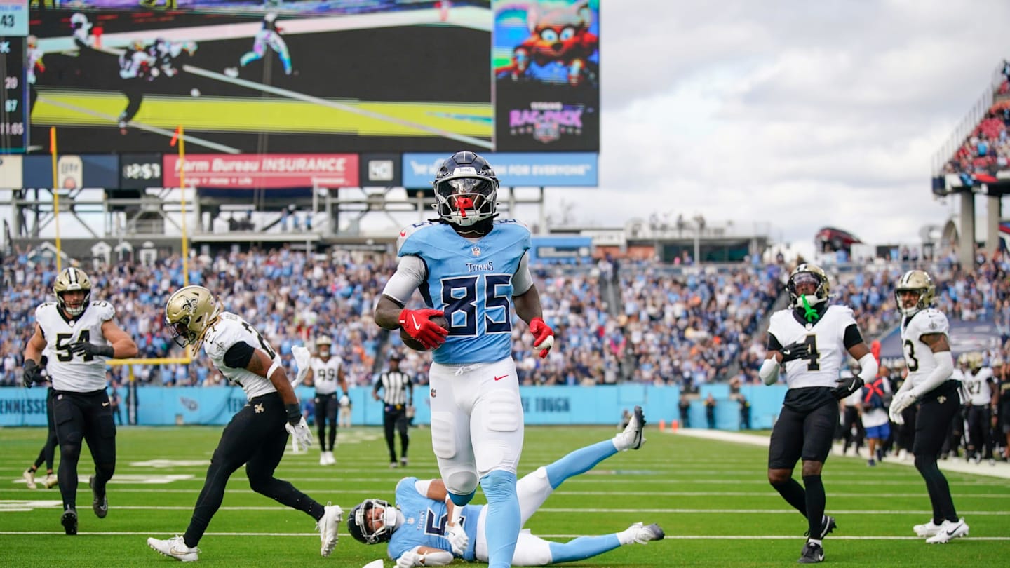 Dec 28, 2025; Nashville, Tennessee, USA; Tennessee Titans tight end Chig Okonkwo (85) makes it to the end zone during the second quarter against the New Orleans Saints at Nissan Stadium. Mandatory Credit: Andrew Nelles-USA TODAY Network via Imagn Images