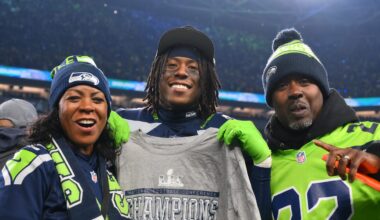Seattle Seahawks wide receiver Rashid Shaheed (22) celebrates with his parents