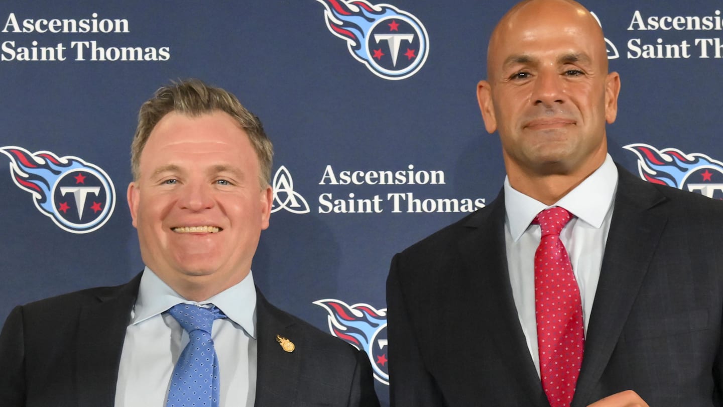 Jan 29, 2026; Nashville, TN, USA;  Tennessee Titans general manager Mike Borgonzi and Tennessee Titans head coach Robert Saleh holds up the Titans jersey during the press conference at Ascension Saint Thomas Sports Park. Mandatory Credit: Steve Roberts-Imagn Images