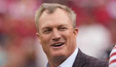 San Francisco 49ers general manager John Lynch (left)