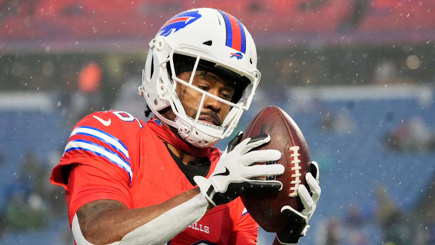 Dec 28, 2025; Orchard Park, New York, USA; Buffalo Bills wide receiver Brandin Cooks (18) warms up in the rain before the game against the Philadelphia Eagles at Highmark Stadium. Mandatory Credit: Gregory Fisher-Imagn Images