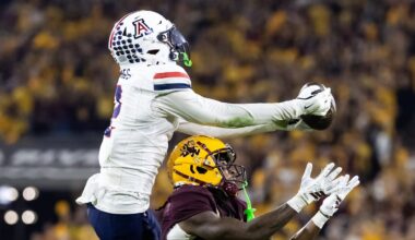 Nov 28, 2025; Tempe, Arizona, USA; Arizona Wildcats defensive back Treydan Stukes (2) intercepts the ball against Arizona State Sun Devils wide receiver Jaren Hamilton (16) in the second half during the 99th Territorial Cup at Mountain America Stadium. Mandatory Credit: Mark J. Rebilas-Imagn Images
