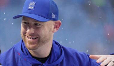 Buffalo Bills offensive coordinator Joe Brady greets players as they take the field before their game against the Bengals at Highmark Stadium in Orchard Park on Dec. 7, 2025.