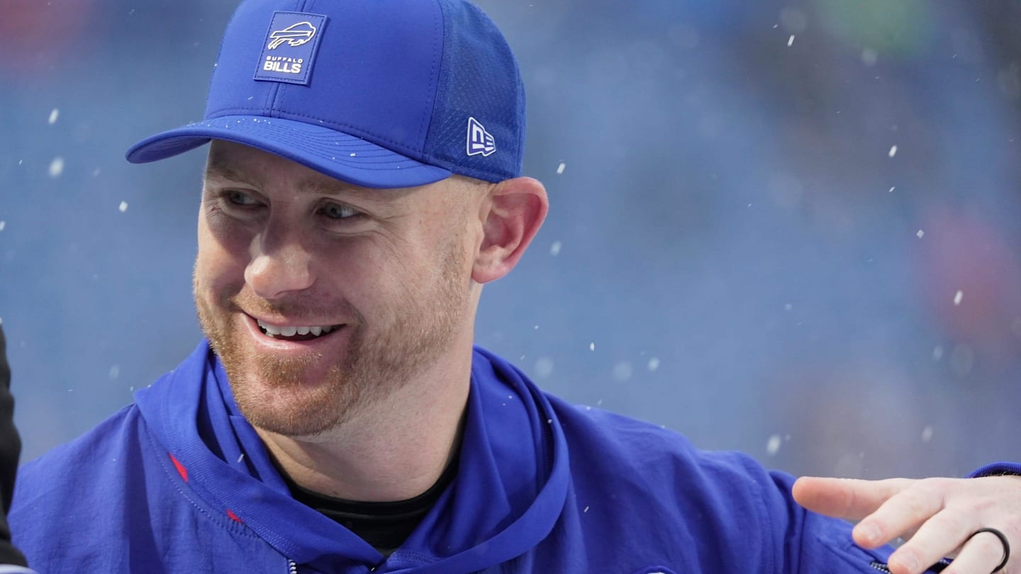 Buffalo Bills offensive coordinator Joe Brady greets players as they take the field before their game against the Bengals at Highmark Stadium in Orchard Park on Dec. 7, 2025.