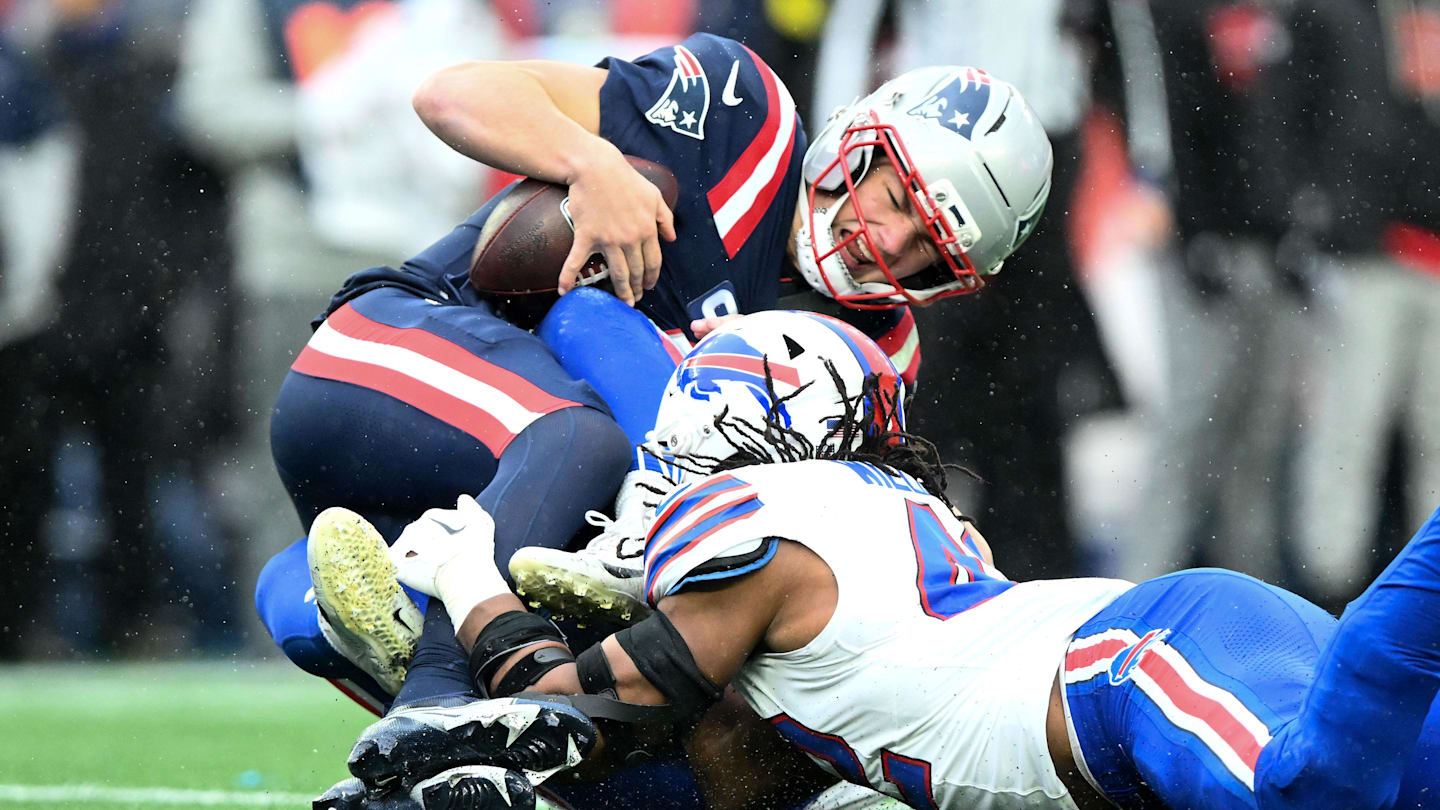 Dec 14, 2025; Foxborough, Massachusetts, USA; New England Patriots quarterback Drake Maye (10) is sacked by Buffalo Bills linebacker Matt Milano (58) during the second half at Gillette Stadium. Mandatory Credit: Brian Fluharty-Imagn Images