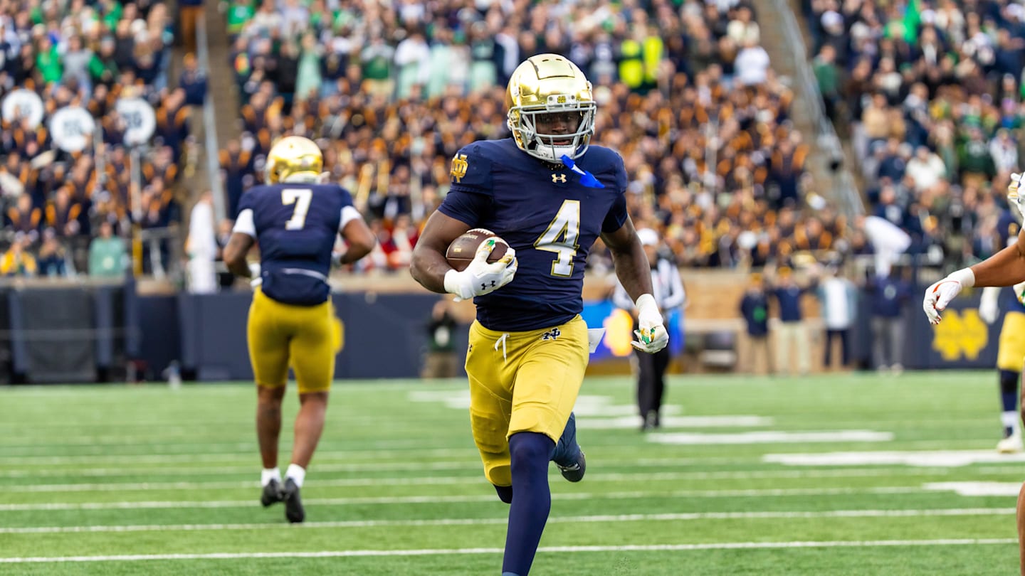 Nov 22, 2025; South Bend, Indiana, USA; Notre Dame Fighting Irish running back Jeremiyah Love (4) breaks loose for a touchdown run against the Syracuse Orange during the first half at Notre Dame Stadium. Mandatory Credit: Michael Caterina-Imagn Images