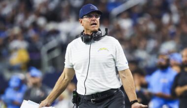 Dec 21, 2025; Arlington, Texas, USA; Los Angeles Chargers head coach Jim Harbaugh reacts to a play against the Dallas Cowboys during the first half at AT&T Stadium. Mandatory Credit: Kevin Jairaj-Imagn Images