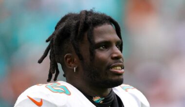 Sep 24, 2023; Miami Gardens, Florida, USA;  Miami Dolphins wide receiver Tyreek Hill (10) looks on from the sidelines against the Denver Broncos in the fourth quarter at Hard Rock Stadium. Mandatory Credit: Nathan Ray Seebeck-Imagn Images