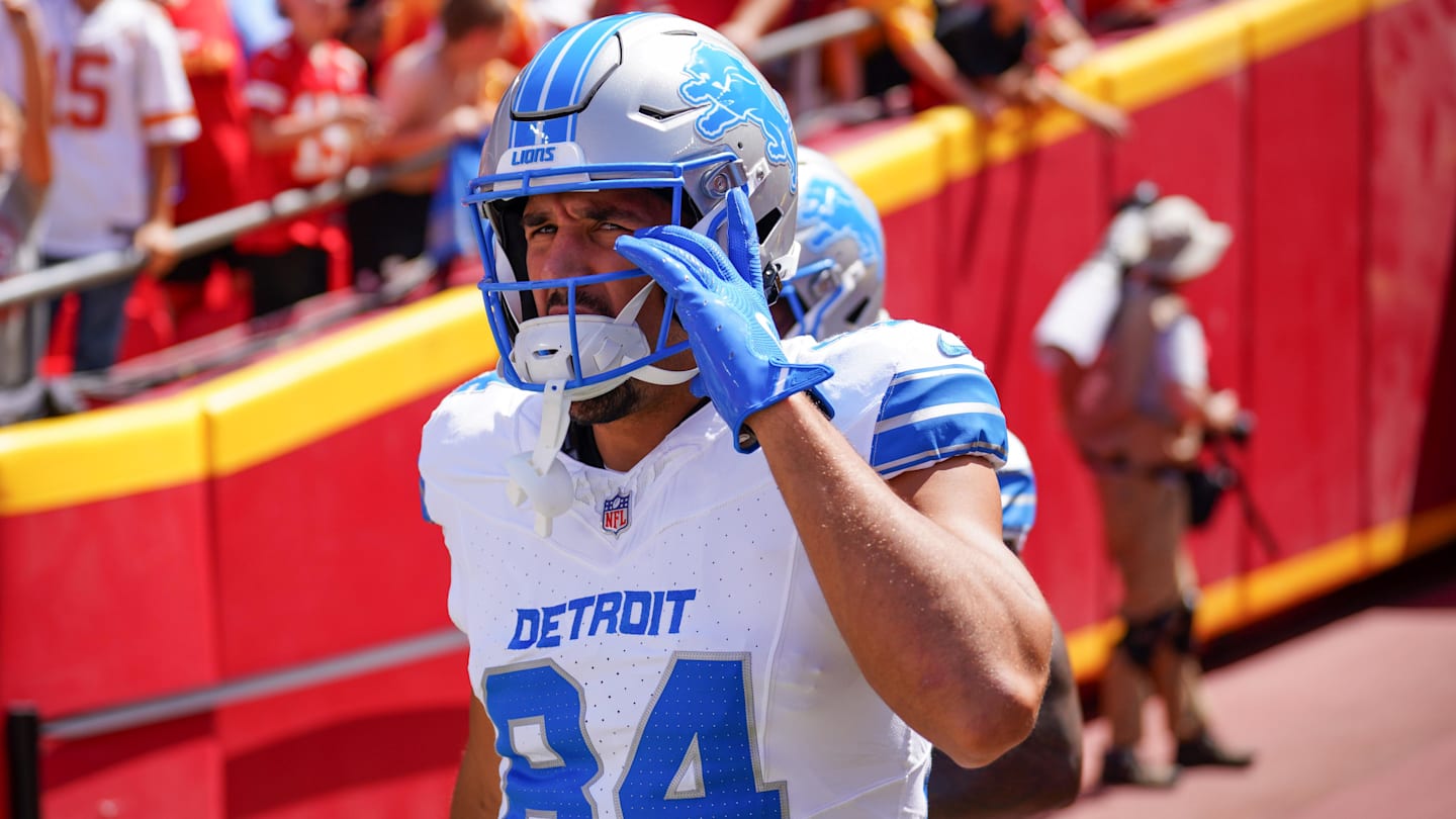 Detroit Lions tight end Shane Zylstra (84) enters the field for warm ups against the Kansas City Chiefs prior to the game at GEHA Field at Arrowhead Stadium.