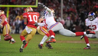 New York Giants middle linebacker Jacquian Williams (57) knocks the ball out of San Francisco 49ers wide receiver Kyle Williams (10)