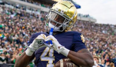 Nov 22, 2025; South Bend, Indiana, USA; Notre Dame Fighting Irish running back Jeremiyah Love (4) celebrates scoring against the Syracuse Orange during the first half at Notre Dame Stadium. Mandatory Credit: Michael Caterina-Imagn Images