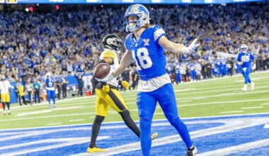 Dec 21, 2025; Detroit, Michigan, USA; Detroit Lions wide receiver Isaac Teslaa (18) scores a touchdown during the third quarter against the Pittsburgh Steelers at Ford Field. Mandatory Credit: David Reginek-Imagn Images