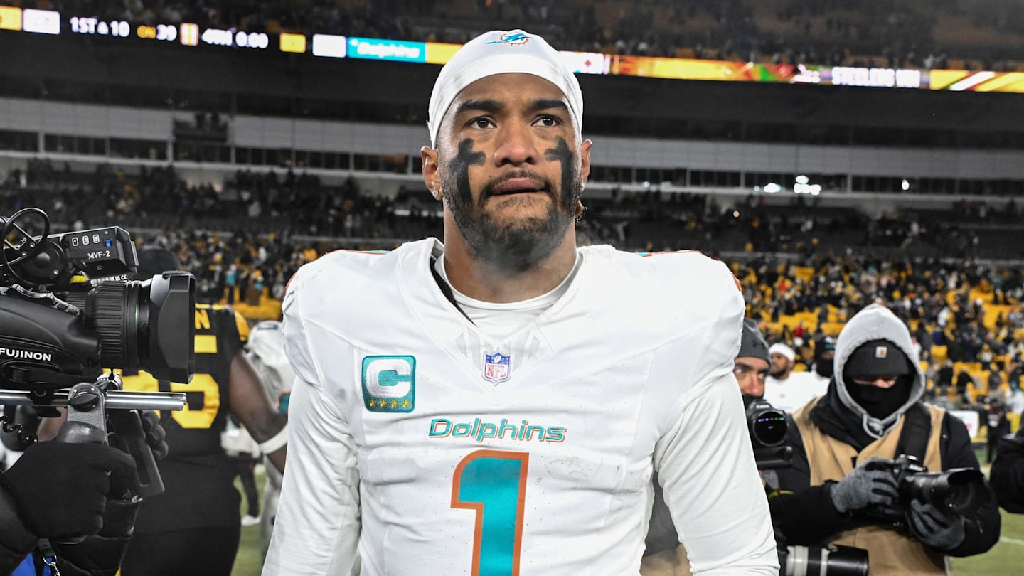 Dec 15, 2025; Pittsburgh, Pennsylvania, USA; Miami Dolphins quarterback Tua Tagovailoa (1) leaves the  field following a game against the Pittsburgh Steelers at Acrisure Stadium. Mandatory Credit: Barry Reeger-Imagn Images
