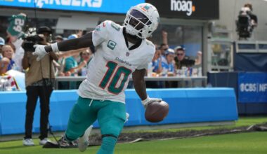 Sep 10, 2023; Inglewood, California, USA; Miami Dolphins wide receiver Tyreek Hill (10) celebrates after catching a 35-yard touchdown pass in the third quarter against the Miami Dolphins at SoFi Stadium. Mandatory Credit: Kirby Lee-Imagn Images