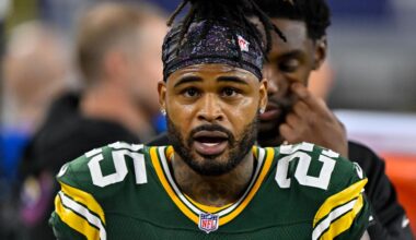 Sep 28, 2025; Arlington, Texas, USA; Green Bay Packers cornerback Keisean Nixon (25) looks on from the sidelines during the game between the Dallas Cowboys and the Green Bay Packers at AT&T Stadium.