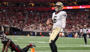 Jan 4, 2026; Atlanta, Georgia, USA; New Orleans Saints quarterback Tyler Shough (6) scores a touchdown against the Atlanta Falcons in the second quarter at Mercedes-Benz Stadium. Mandatory Credit: Brett Davis-Imagn Images