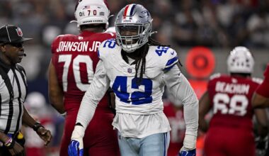 Nov 24, 2024; Charlotte, North Carolina, USA; Carolina Panthers linebacker Jadeveon Clowney (7) runs on to the field with the american flag before the game at Bank of America Stadium. Mandatory Credit: Bob Donnan-Imagn Images