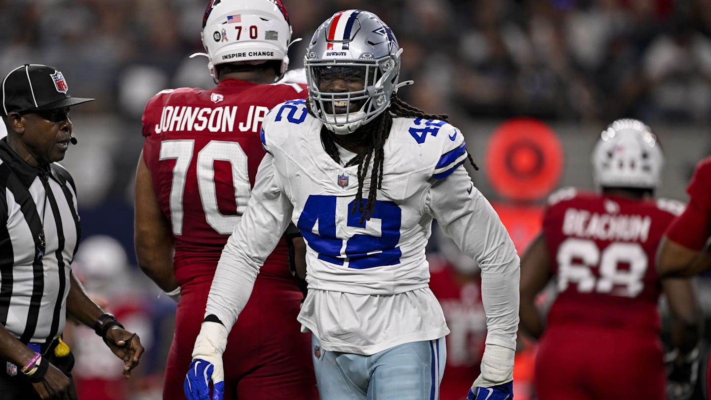 Nov 24, 2024; Charlotte, North Carolina, USA; Carolina Panthers linebacker Jadeveon Clowney (7) runs on to the field with the american flag before the game at Bank of America Stadium. Mandatory Credit: Bob Donnan-Imagn Images