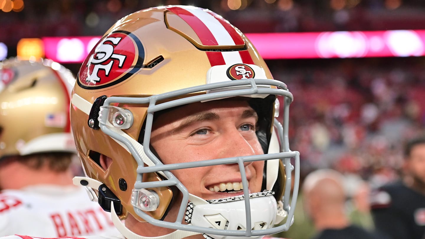Nov 16, 2025; Glendale, Arizona, USA; San Francisco 49ers quarterback Mac Jones (10) looks on after defeating the Arizona Cardinals at State Farm Stadium. Mandatory Credit: Matt Kartozian-Imagn Images