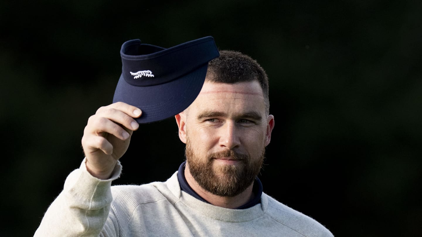 February 13, 2026; Pebble Beach, California, USA; Kansas City Chiefs tight end Travis Kelce acknowledges the crowd on the first hole during the second round of the AT&T Pebble Beach Pro-Am golf tournament at Pebble Beach Golf Links. Mandatory Credit: Kyle Terada-Imagn Images