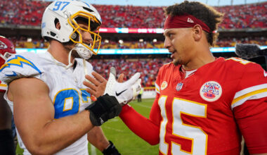 Oct 22, 2023; Kansas City, Missouri, USA; Los Angeles Chargers linebacker Joey Bosa (97) talks with Kansas City Chiefs quarterback Patrick Mahomes (15) after a game at GEHA Field at Arrowhead Stadium.
