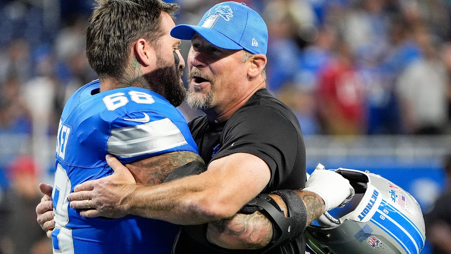 Detroit Lions head coach Dan Campbell hugs offensive tackle Taylor Decker (68) during warm up before the Tampa Bay Buccaneers game at Ford Field in Detroit on Sunday, September 15, 2024.