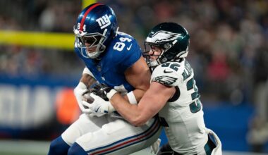 New York Giants tight end Theo Johnson (84) catches a pass before being tackled by Philadelphia Eagles safety Reed Blankenship (32) during a Thursday Night Football game between the New York Giants and the Philadelphia Eagles at MetLife Stadium in East Rutherford on Oct. 9, 2025.