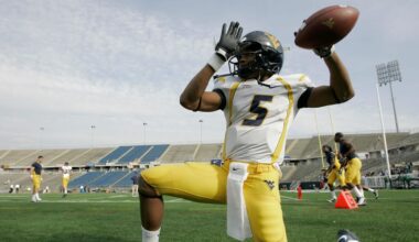Nov 1, 2008; East Hartford, CT, USA; West Virginia Mountaineers quarterback Pat White (5) warms up before the start of the game against the Connecticut Huskies at Rentschler Field. Mandatory Credit: David Butler II-Imagn Images
