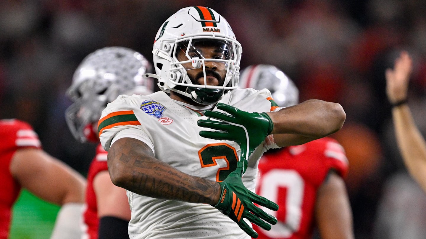 Dec 31, 2025; Arlington, TX, USA; Miami Hurricanes defensive lineman Akheem Mesidor (3) celebrates after he sacks Ohio State Buckeyes quarterback Julian Sayin (not pictured) during the 2025 Cotton Bowl and quarterfinal game of the College Football Playoff at AT&T Stadium. Mandatory Credit: Jerome Miron-Imagn Images