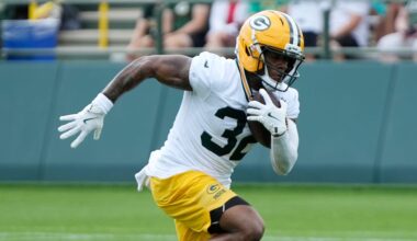 Green Bay Packers running back MarShawn Lloyd (32) runs through a drill during the second day of training camp on Thursday, July 24, 2025, at Ray Nitschke Field in Ashwaubenon, Wis.