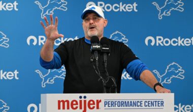 Jul 28, 2025; Allen Park, MI, USA;  Detroit Lions offensive coordinator John Morton talks with the media before the Lions take the field for practice at Meijer Performance Center. Mandatory Credit: Lon Horwedel-Imagn Images