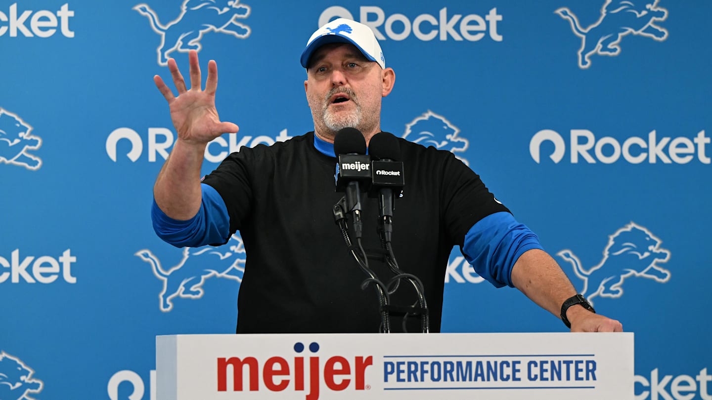 Jul 28, 2025; Allen Park, MI, USA;  Detroit Lions offensive coordinator John Morton talks with the media before the Lions take the field for practice at Meijer Performance Center. Mandatory Credit: Lon Horwedel-Imagn Images