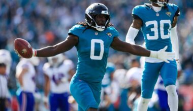 Jacksonville Jaguars linebacker Devin Lloyd (0) celebrates a fumble recovery with cornerback Montaric Brown (30) during the second quarter of an NFL football AFC Wild Card playoff matchup, Sunday, Jan. 11, 2026, in Jacksonville, Fla. [Corey Perrine/Florida Times-Union]