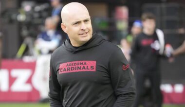 Arizona Cardinals offensive coordinator Drew Petzing watches his players warm up before playing against the Seattle Seahawks at State Farm Stadium in Glendale on Dec. 8, 2024.