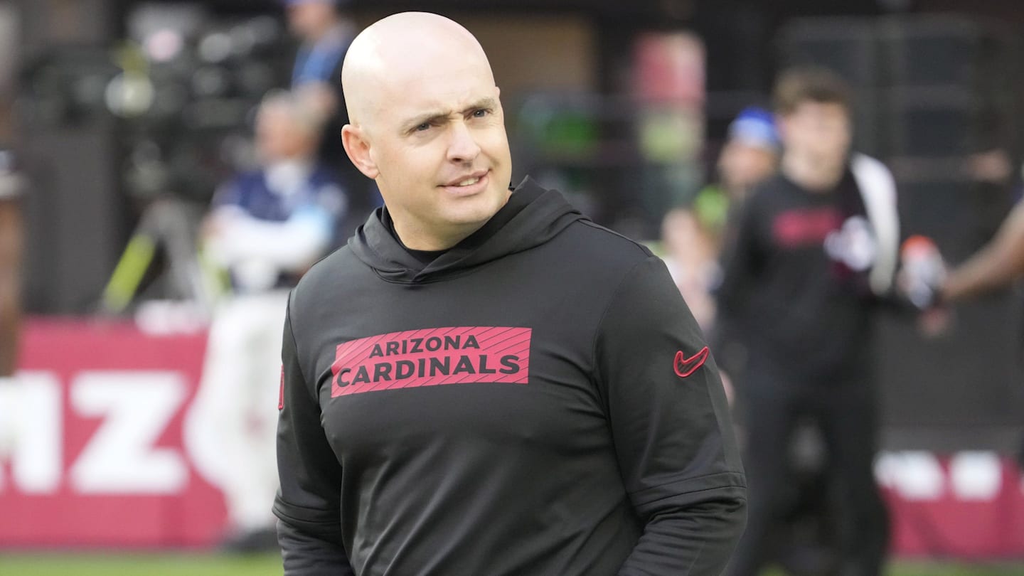 Arizona Cardinals offensive coordinator Drew Petzing watches his players warm up before playing against the Seattle Seahawks at State Farm Stadium in Glendale on Dec. 8, 2024.