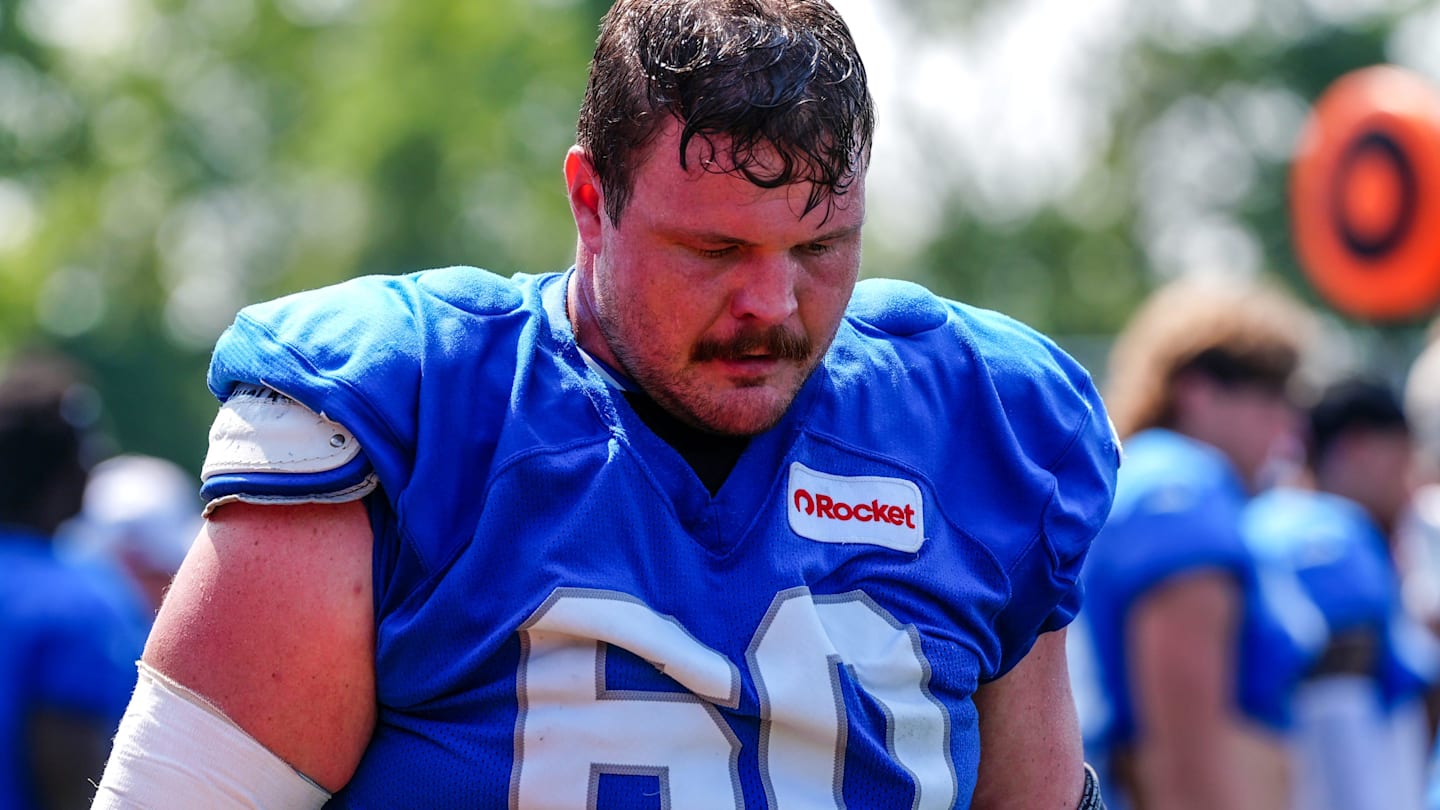 Detroit Lions OL Graham Glasgow walks off the field at the end of the joint practice with the Miami Dolphins at the Lions headquarters and training facility in Allen Park, Thursday, Aug. 14 2025