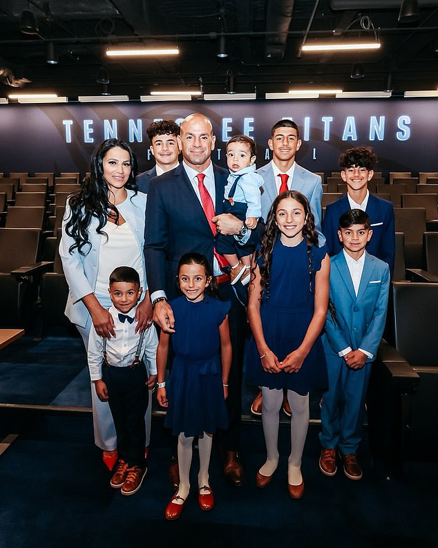 The 46-year-old was joined by his wife Sanaa and their eight children at the press conference