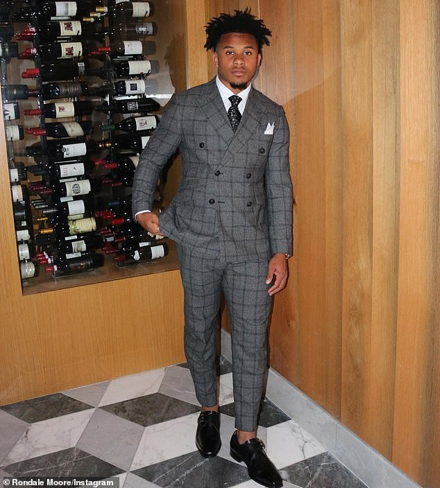 Moore was found in his garage with what is believed to be a self-inflicted gunshot wound, police said