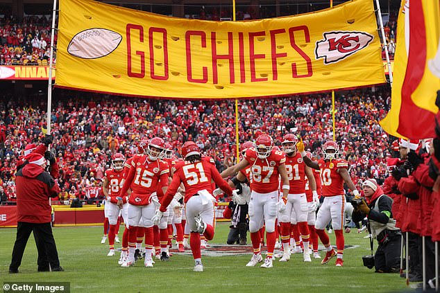 Danna runs onto the field to high-five Patrick Mahomes and Travis Kelce in the 2023 season