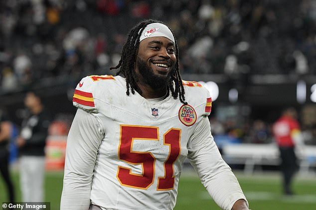 Mike Danna smiles as he walks off the field for the final time as a Kansas City Chiefs player