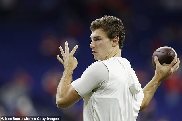 Fernando Mendoza is pictured warming up before winning the Big Ten Championship with IU